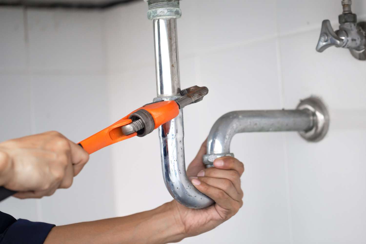 water line repair plumber at work in a bathroom, water line repair service, assemble and install concept.