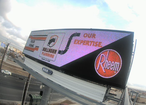 Bullhorn Plumbing service billboard in San Antonio TX featuring Rheem plumbing products